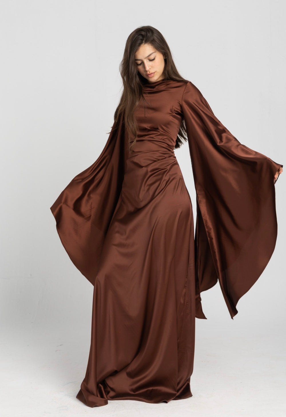 Sun Dress in Brown – floor-length satin maxi dress with flared sleeves and gathered waist