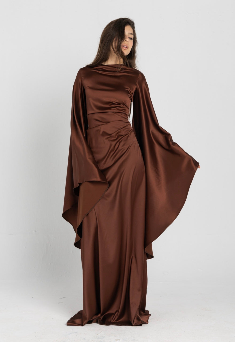 Sun Dress in Brown – floor-length satin maxi dress with flared sleeves and gathered waist