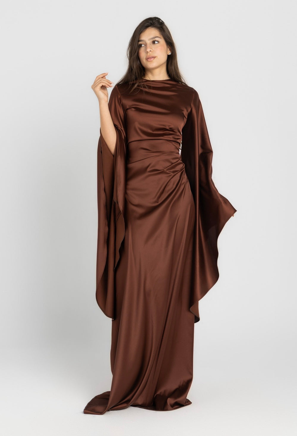 Sun Dress in Brown – floor-length satin maxi dress with flared sleeves and gathered waist
